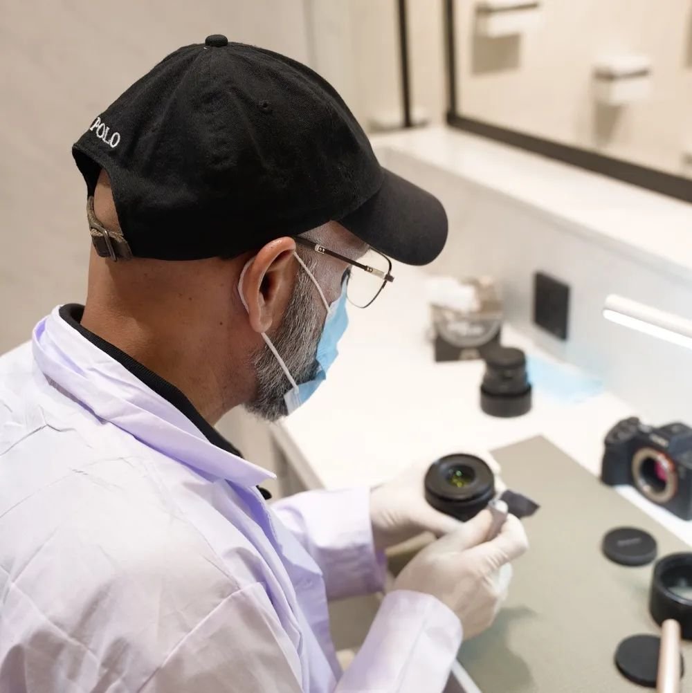 Lens inspection at the Hope Enterprises SIGMA event